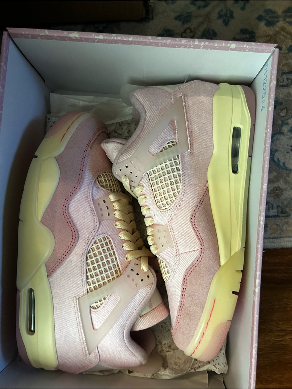 Iced Carmine Jordan 4s in box